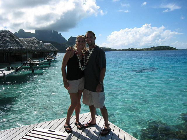 Us on our patio at our overwater bungalow