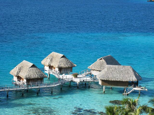 looking down at overwater bungalows at our hotel