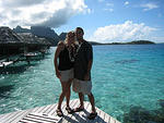 Us on our patio at our overwater bungalow